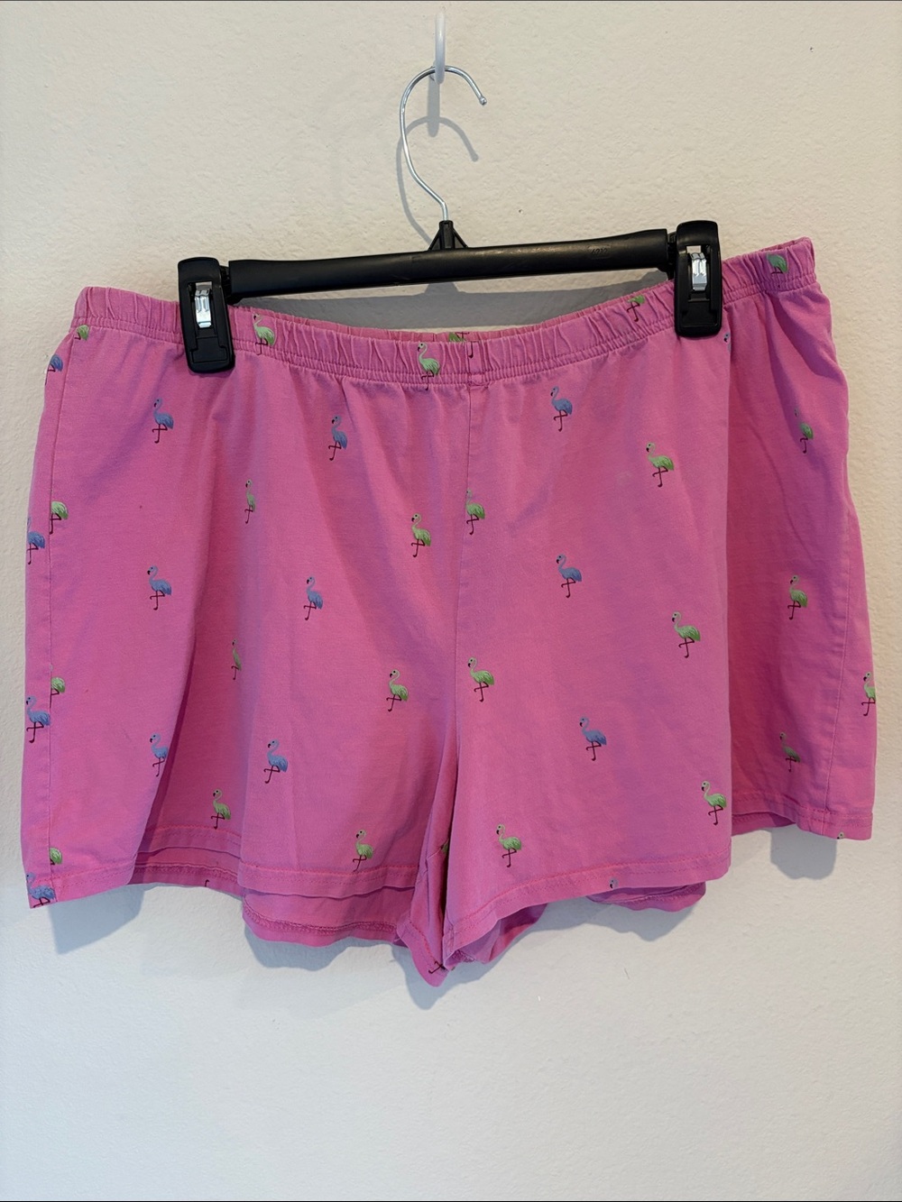 Pink shorts with green and blue flamingos with elastic waistband.  🦩 100% Cotton